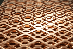 close up of copper mesh screen for custom copper chimney cap