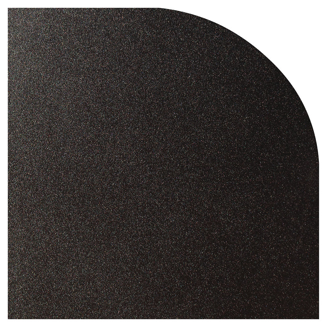Black textured quarter round corner trim on a white background
